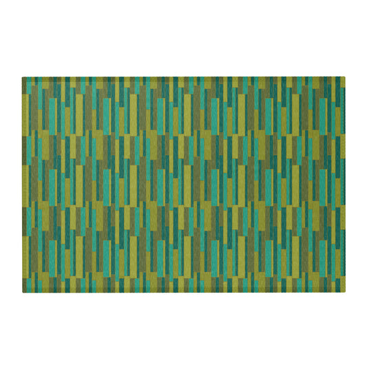 Rectangular area rug with teal, green, and gold vertical geometric block pattern