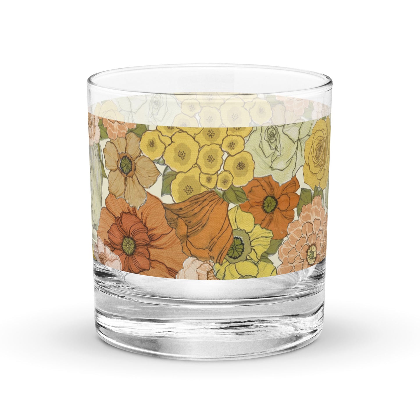 Floral rocks glass with yellow and orange flower artwork on clear glass