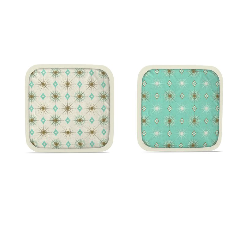 Set of two hot plate holders: cream and teal starburst-and-diamond designs