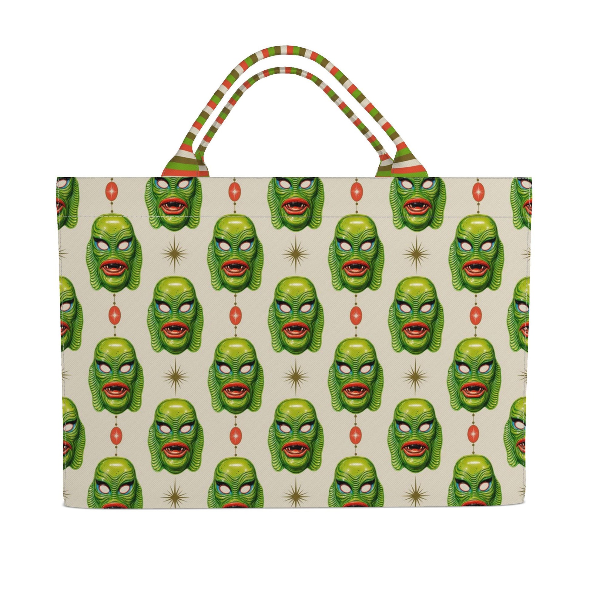 Printed monster face tote bag with green striped handles