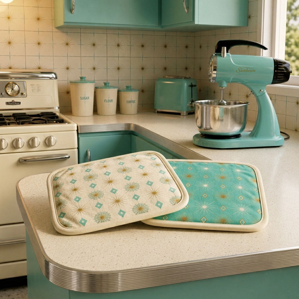 Hot plate holder set, teal and cream patterned holders stacked on counter
