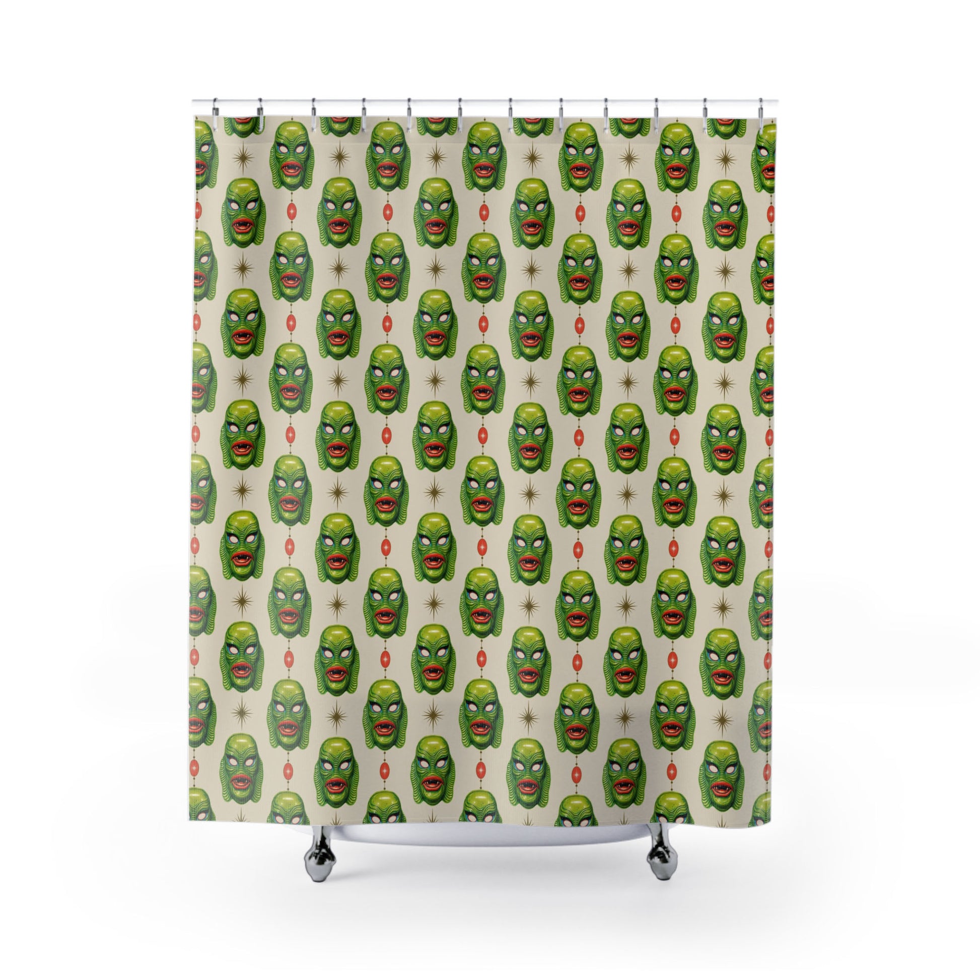 Shower curtain with green monster face pattern on light background and top grommets