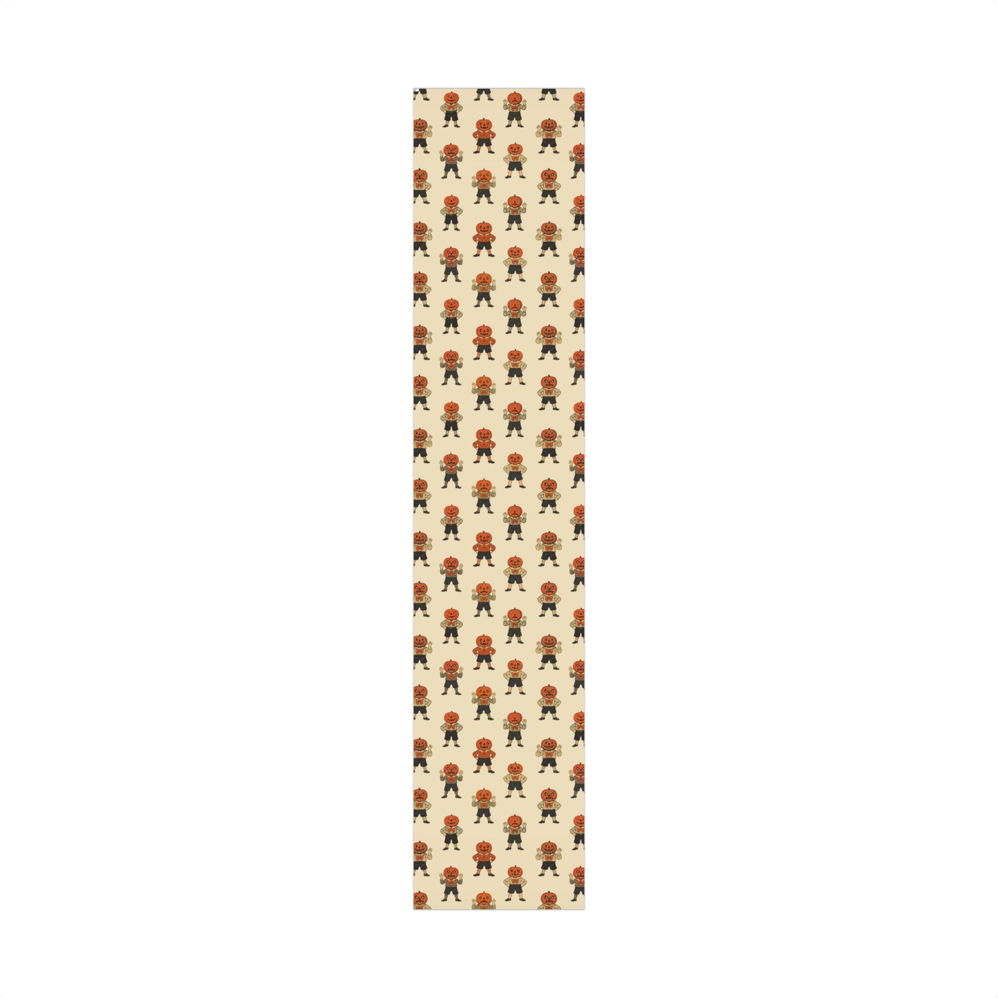 Cream wrapping paper strip with repeating jack-o'-lantern boy figures in orange and black